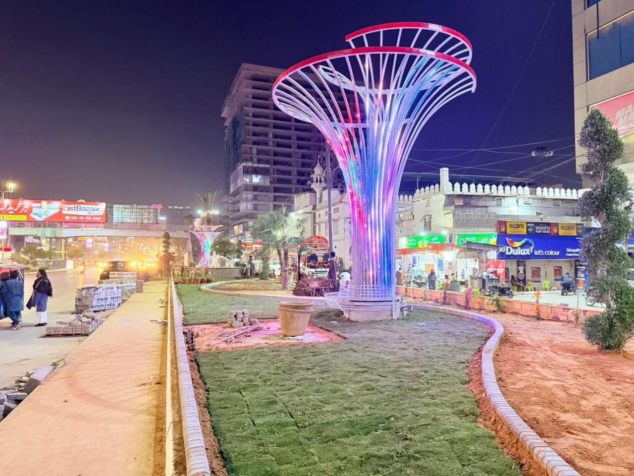 Click Karachi urban beautification - illuminated public space at night